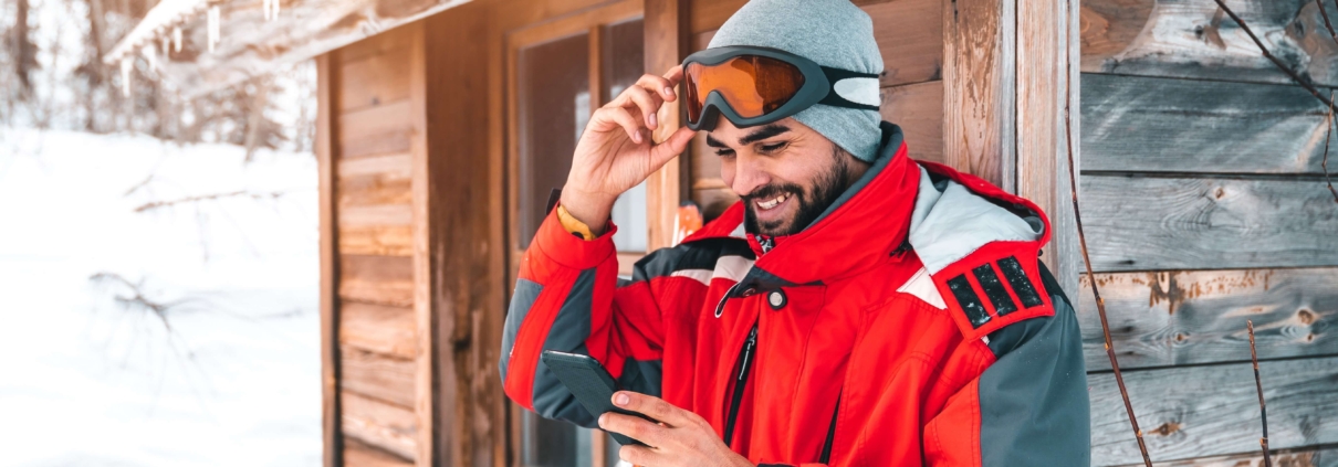 A man looking at Ski Apps.